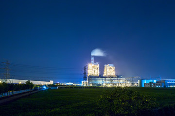 Fototapeta na wymiar thermal power station near a high way road