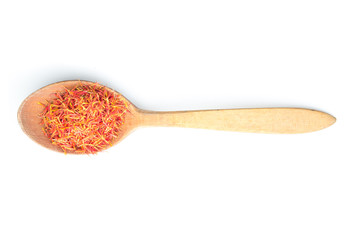 Aromatic saffron spice on wooden spoon. Top view point.