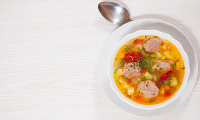 Soup with meatballs and vegetables