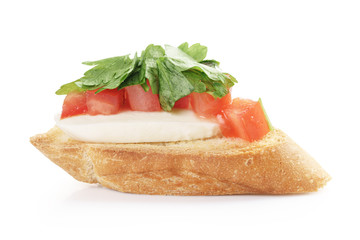 crostini with tomato, mozzarell and parsley isolated