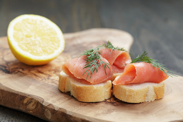 canapes with salmon, dill and lemon