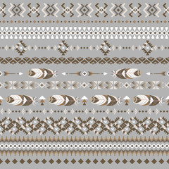 Seamless ethnic Indian pattern. Pattern with feathers and other tribal elements. Abstract pattern.