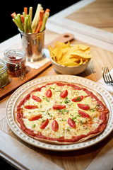 Pizza Margherita on table