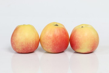 red and yellow apples fruit isolated on white background