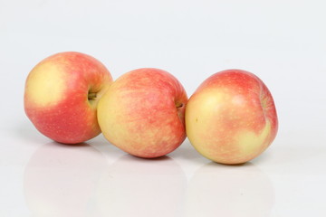 red and yellow apples fruit isolated on white background