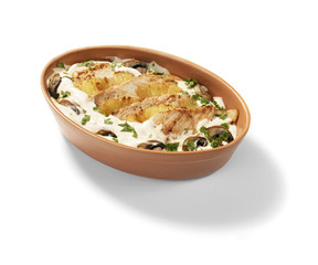 baked chicken with sour cream and pineapple isolated on white background