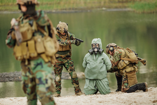 Army rangers captured a scientist with protective mask and prote