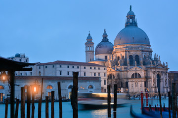 Basilica architecture landmark across the Grand canal in Venice at dusk in Italy