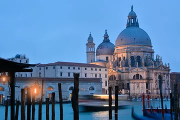 Zelfklevend Fotobehang Basilica architecture landmark across the Grand canal in Venice at dusk in Italy © cristianbalate