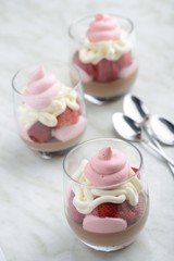 three cups of strawberry panna cotta