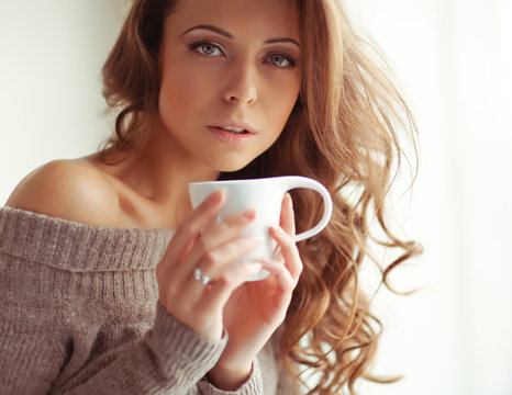 Sexy woman are enjoying the coffee