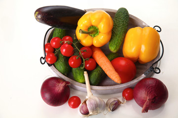 Fresh autumn vegetables on a white background