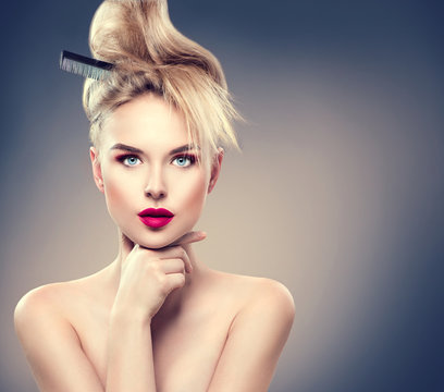 Beauty woman with modern hairstyle and perfect glamour makeup