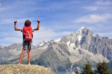 Fototapeta premium Boy looking at mountains, France