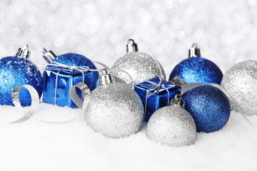 Christmas balls on snow