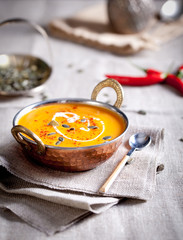Pumpkin cream-soup with chili and seeds