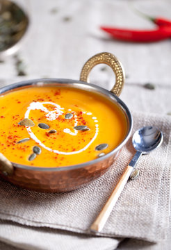 Pumpkin cream-soup with chili and seeds