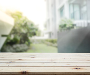 Table Top And Blur Building Of Background