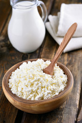 Curd cheese in wooden bowl
