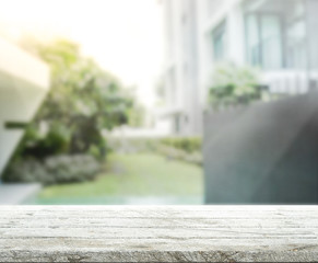 Table Top And Blur Building Of Background