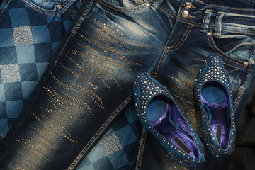 Beautiful denim shoes are on the jeans