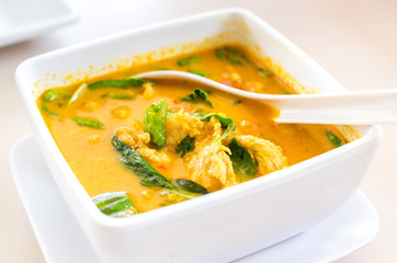 Thai yellow curry soup on table,Thai food style - obrazy, fototapety, plakaty