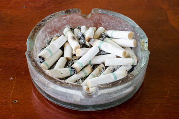 Cigarette in ashtray