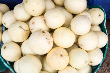 pile of cantaloupe fruit for sale