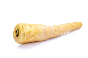 Fresh parsnip roots on a white background