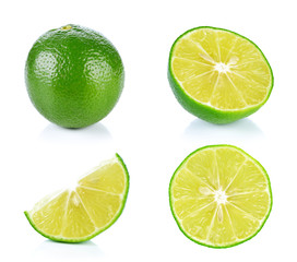 Limes with slices isolated on white background