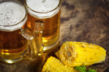 Cold beers with corn on the cob © circleps
