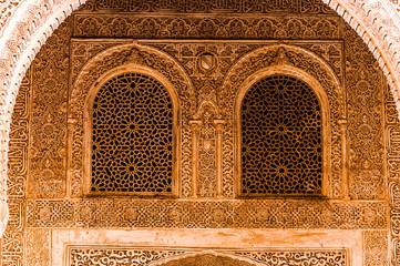 archs and windows in moorish decoration, Alhambra, Spain