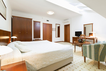 Bedroom interior in loft apartment