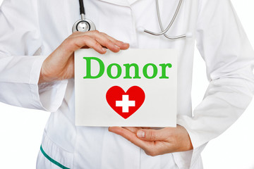 The female doctor, with the plate Donor,  medical concept