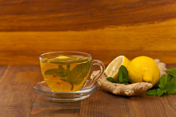 Ginger tea. Ginger, lemon, mint leaves. Selective focus.
