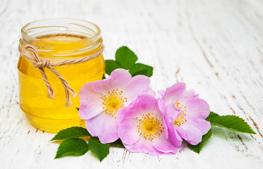 Honey and dog rose flowers