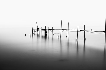 A Long Exposure of an ruined Pier in the Middle of the Sea.Processed in B&W.