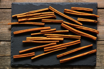 Cinnamon sticks on slate