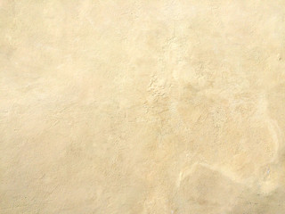 Texture concrete wall.
Rough concrete wall texture, ocher.