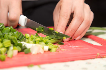 sliced green onions with a knife