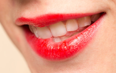 Obraz premium beautiful smile with red lips