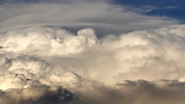 Cumulonimbus clouds churning and bubbling. 4K UHD time-lapse.
