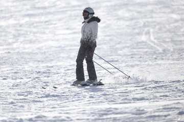 Fototapeta na wymiar woman on the slope.Skiing.
