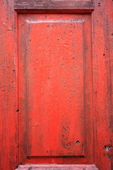 red painted wooden door detail texture background