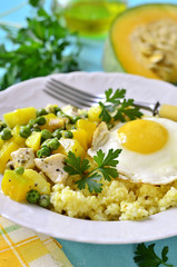 Healthy breakfast - couscous,vegetable ragout with chicken and f