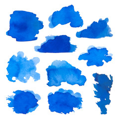 Set of blue ink stains in the form of clouds isolated on white. Vector.