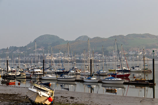 Boats moored in the Conwy harbour in northern Wales, UK