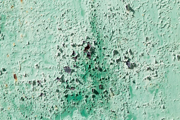 old background of rusty metal painted green