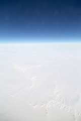 snowy land. view from the airplane