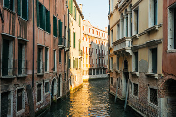 canal and traditional buildings of Venice, Italy.